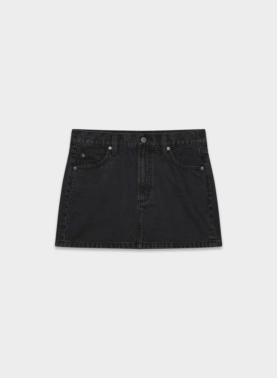 denim forum 90-tallets ricci-dongerskjørt svart eyeliner