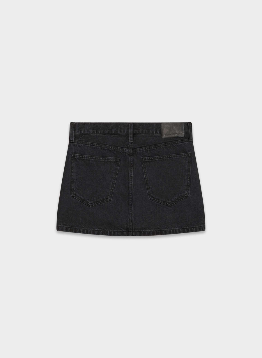 denim forum 90-tallets ricci-dongerskjørt svart eyeliner