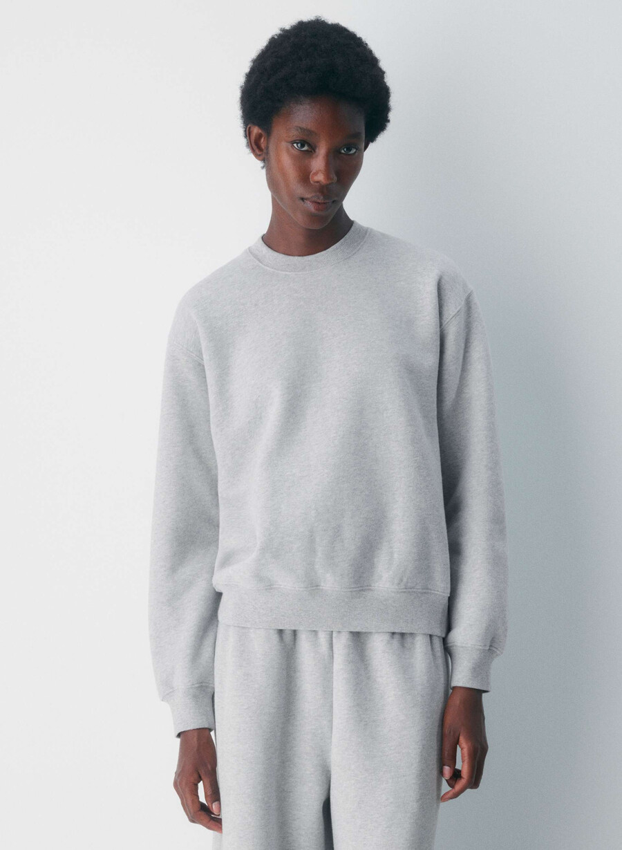 koselig fleece perfect crew-genser i melange med lyserøde detaljer