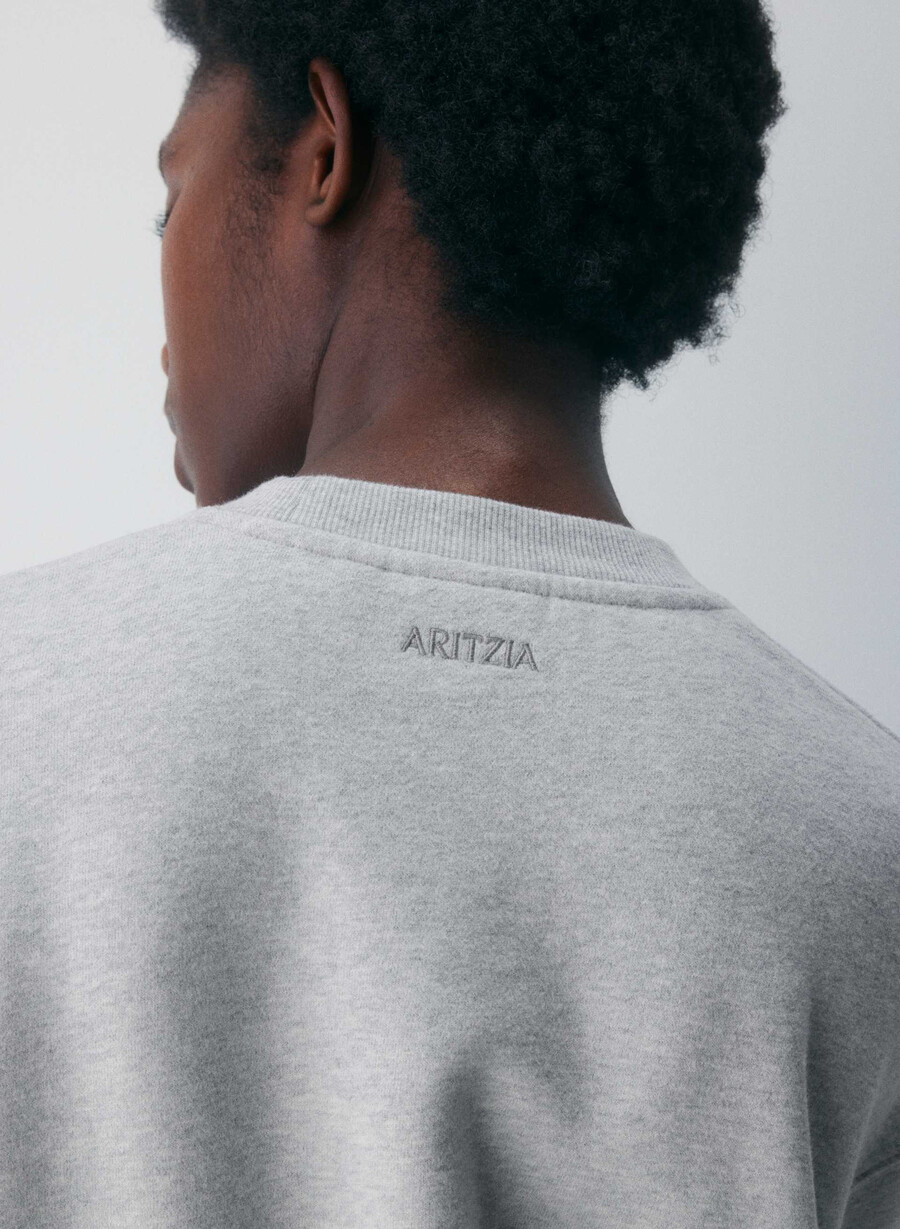koselig fleece perfect crew-genser i melange med lyserøde detaljer
