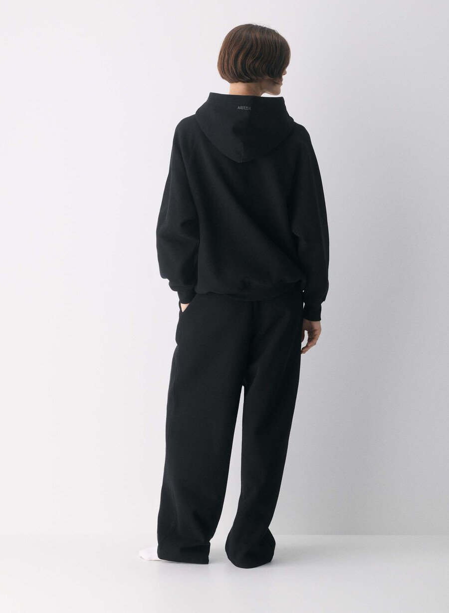 koselig fleece mega raglan hettegenser i svart