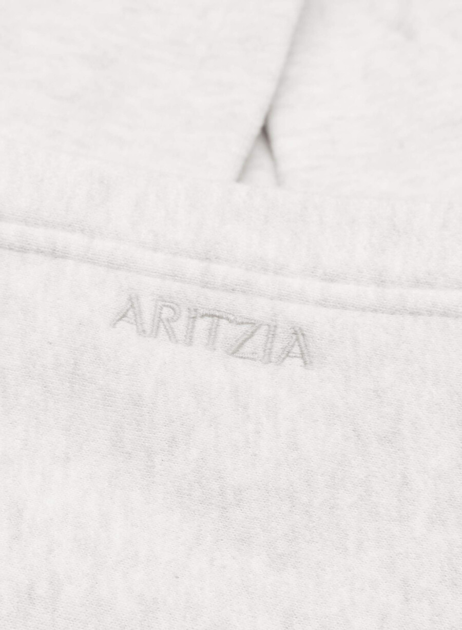 koselig hettegenser i fleece mega raglan i hvitt og lyseblått.