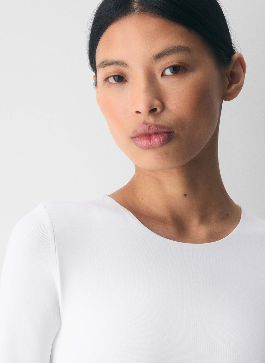 original contour prosperity crew bodysuit i lys hvit