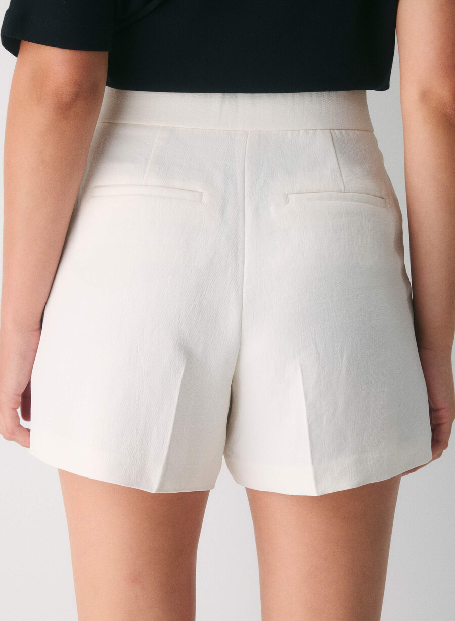 limitless short curve-fit mid-thigh – crepette lys bjØrk