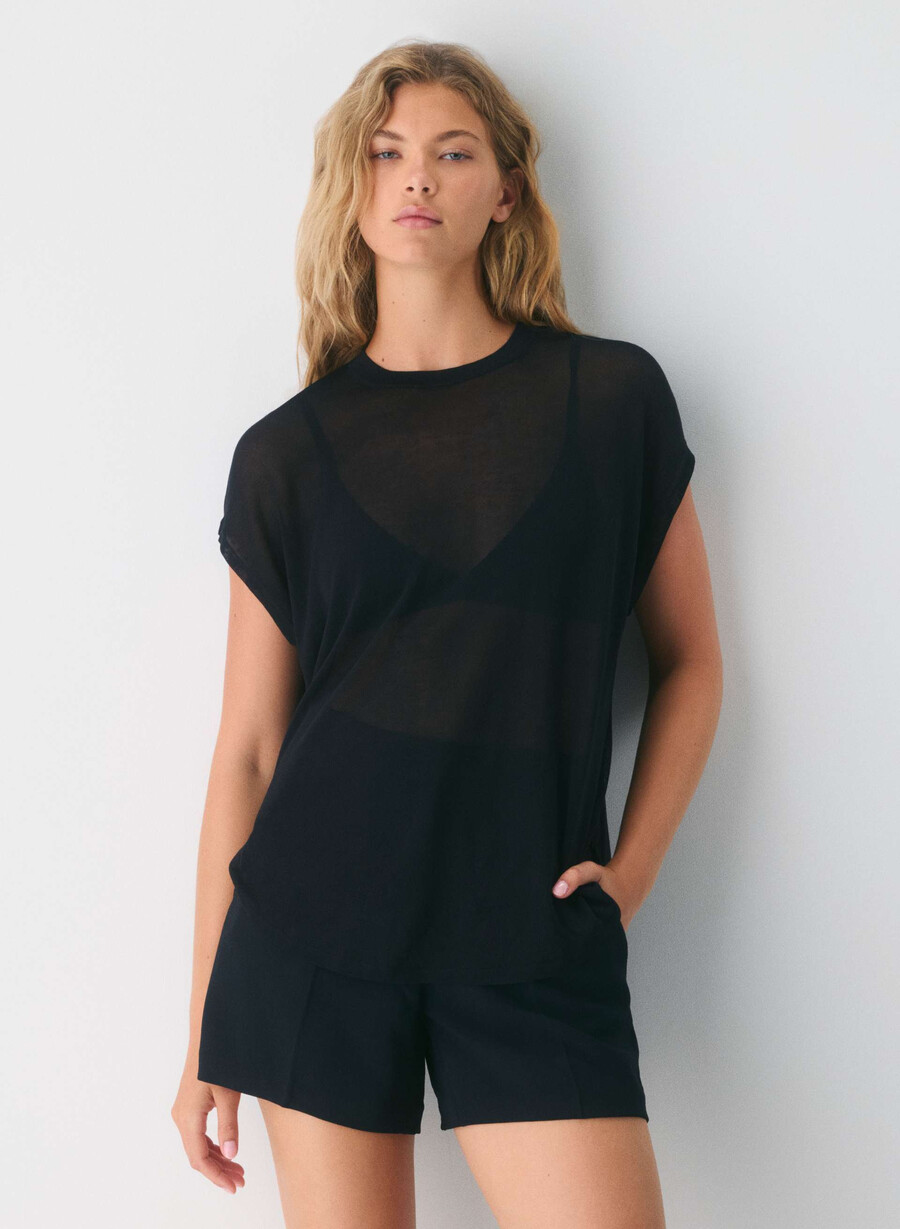 limitless short curve-fit mid-thigh – crepette svart