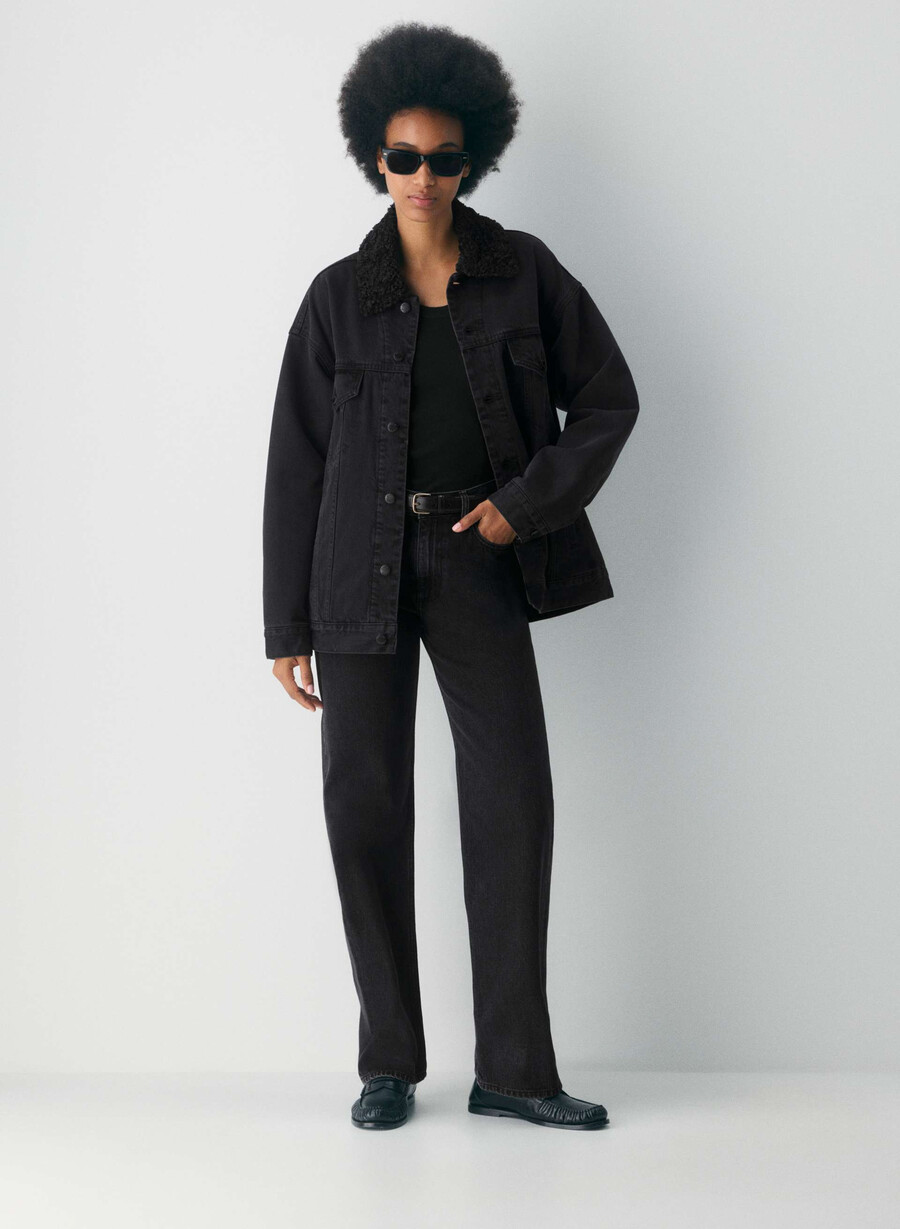 denim forum 90-tallets vintage sherpa-dongerijakke svart eyeliner