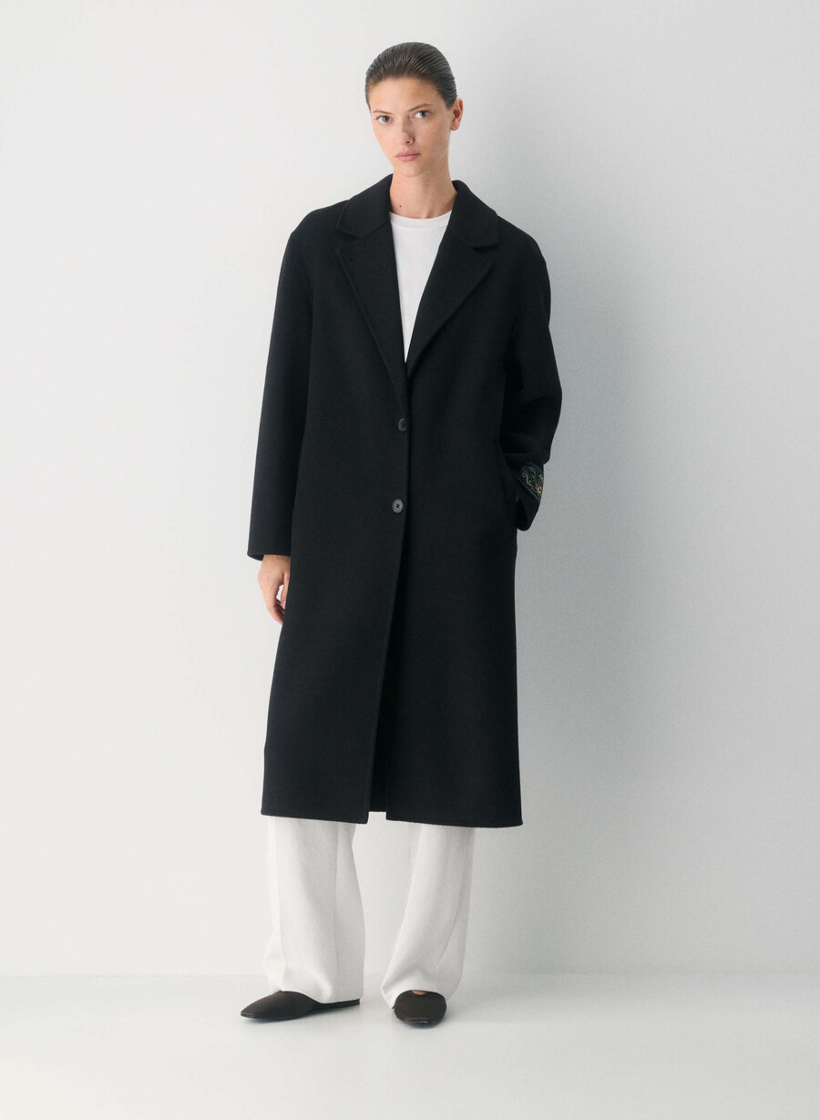 den eneste dobbeltsidige kåpen - luxe rewool svart