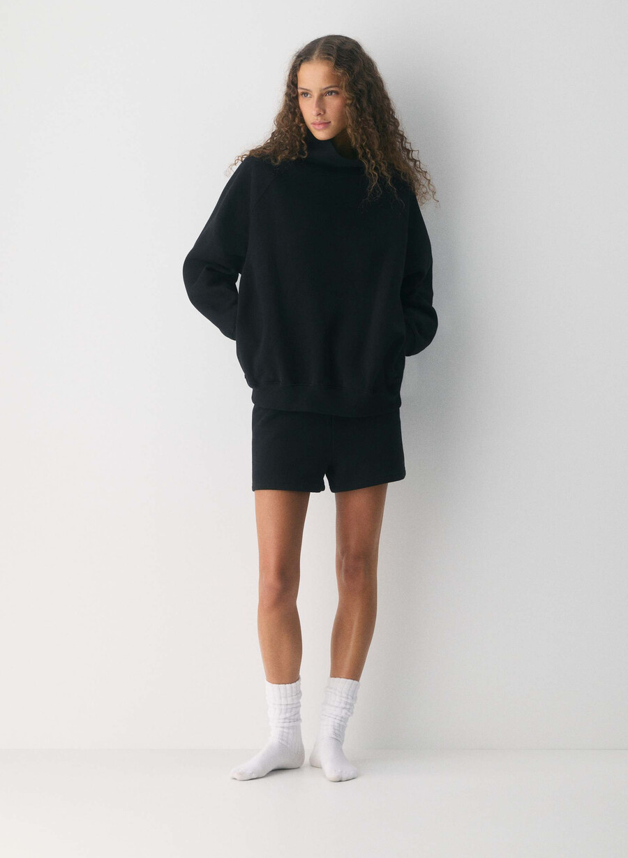 koselig svettefleece mega raglan trakthals svart