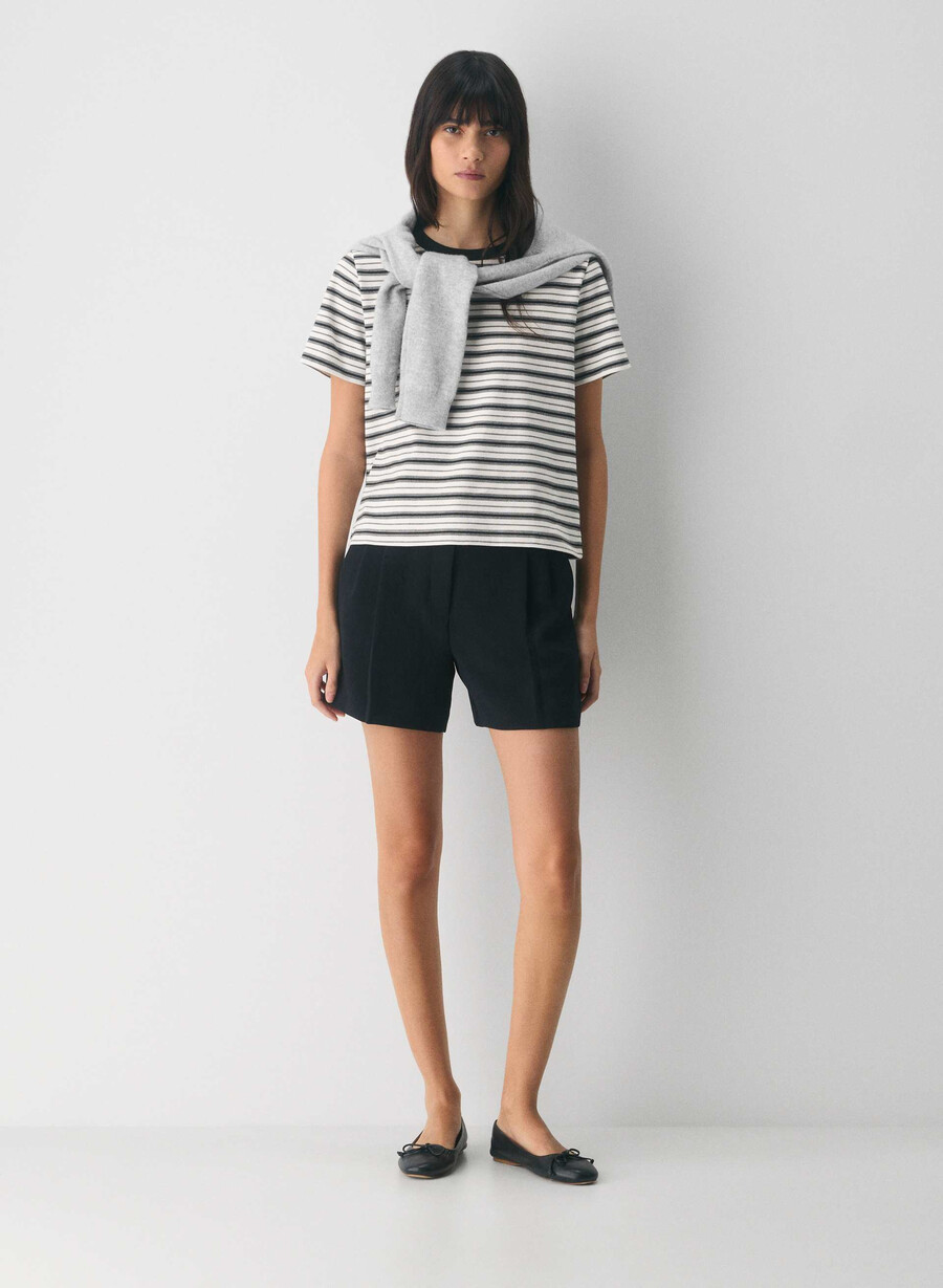 the effortless short mid-thigh – crepette svart