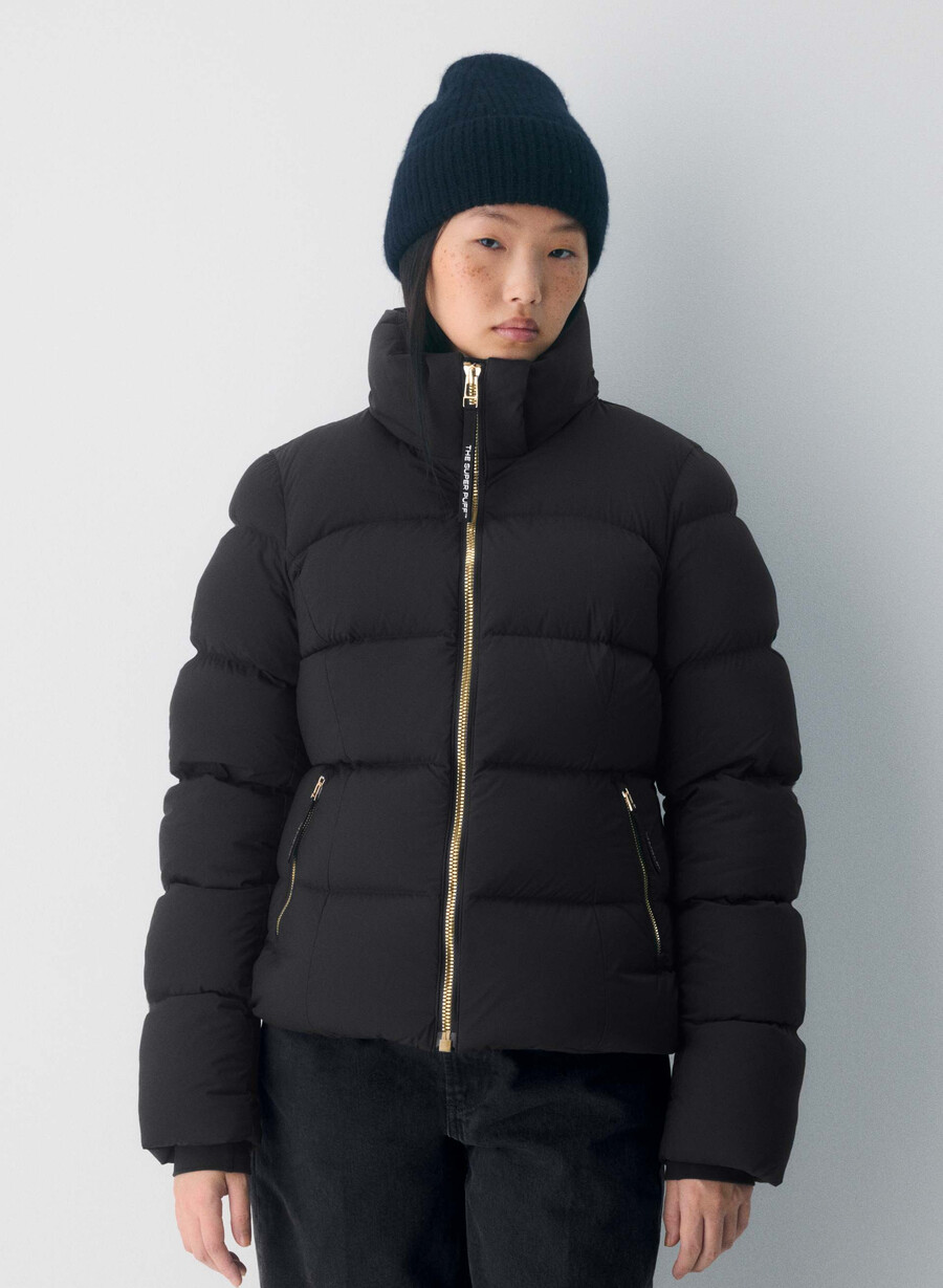 supersnug puff – climatte svartskinnende gull