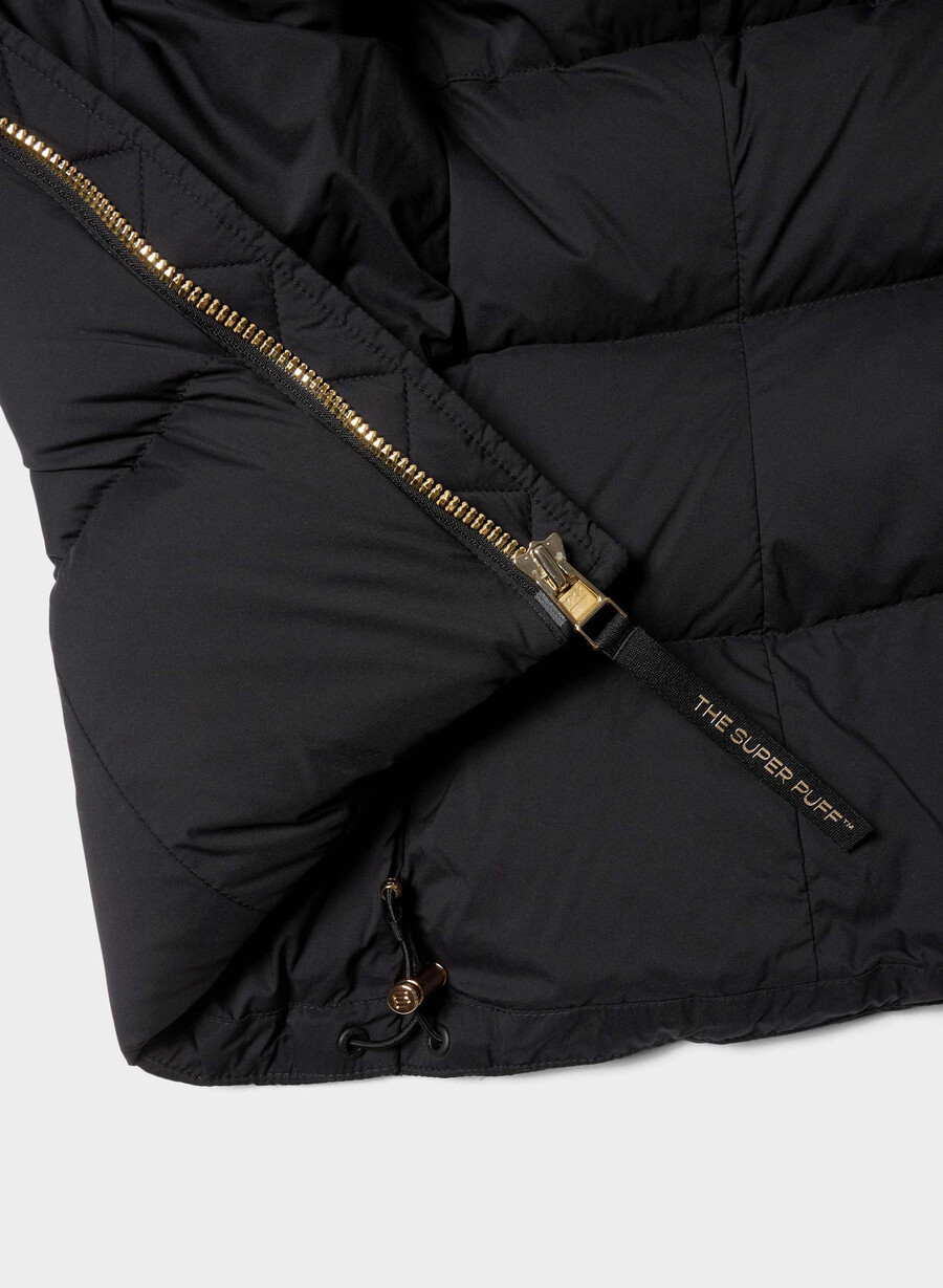 supersnug puff – climatte svartskinnende gull