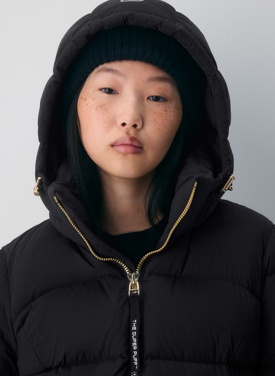 supersnug puff – climatte svartskinnende gull