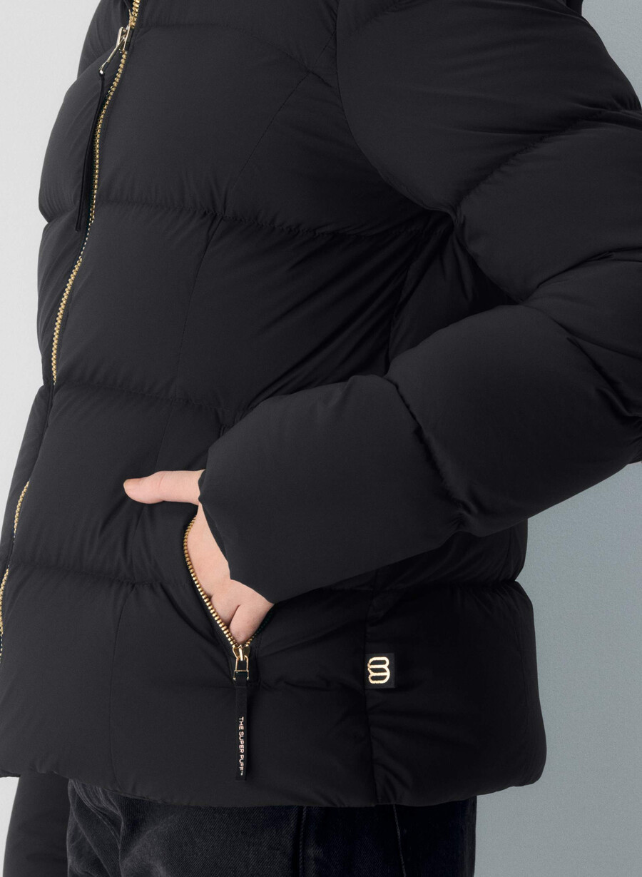 supersnug puff – climatte svartskinnende gull
