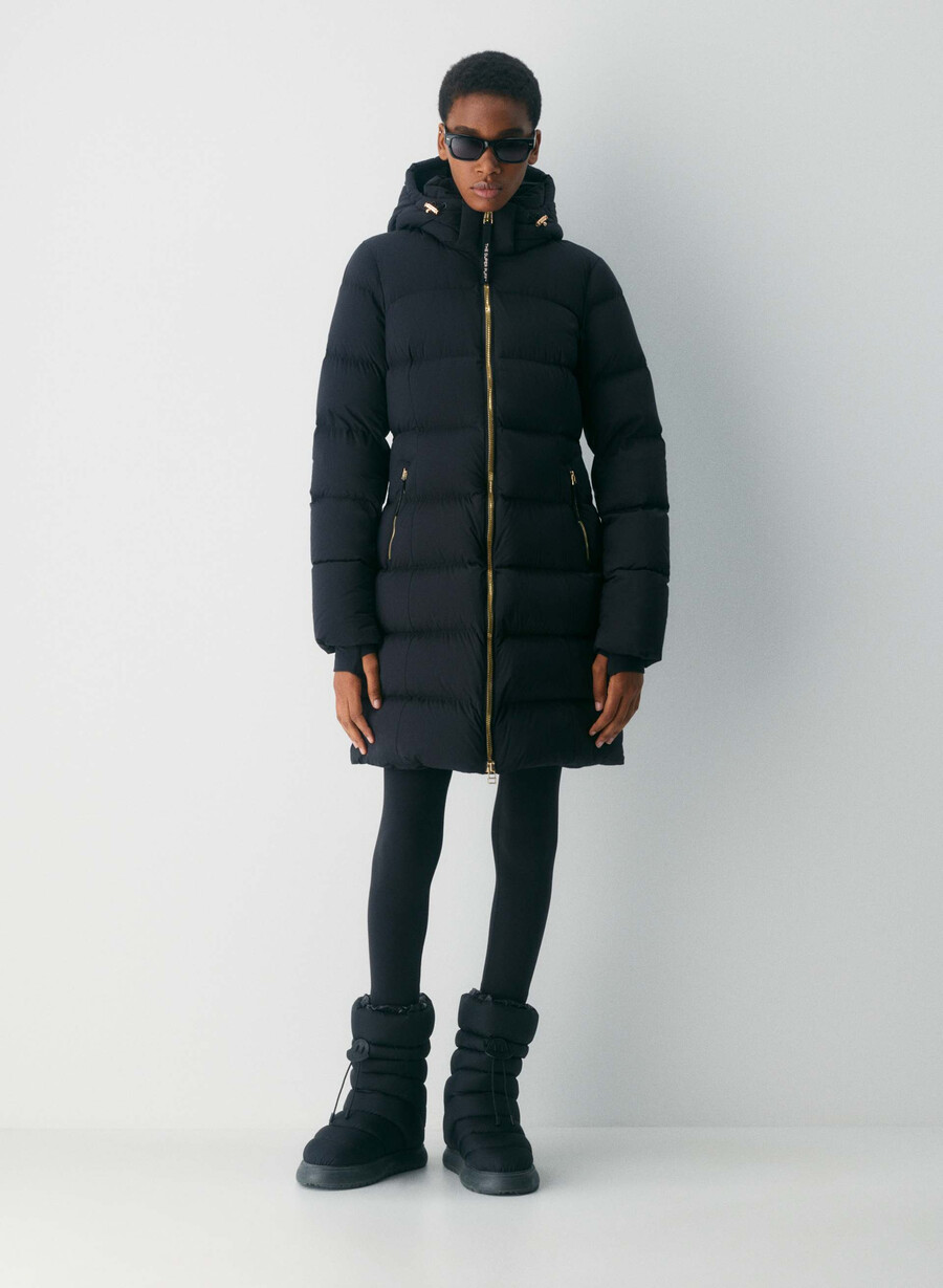 supersnug puff mid - climatte svartskinnende gull
