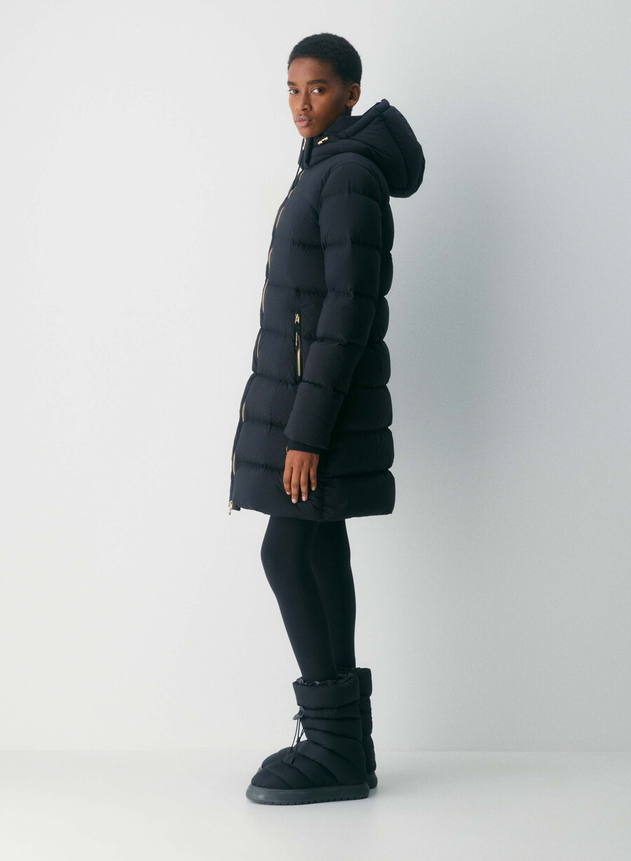 supersnug puff mid - climatte svartskinnende gull