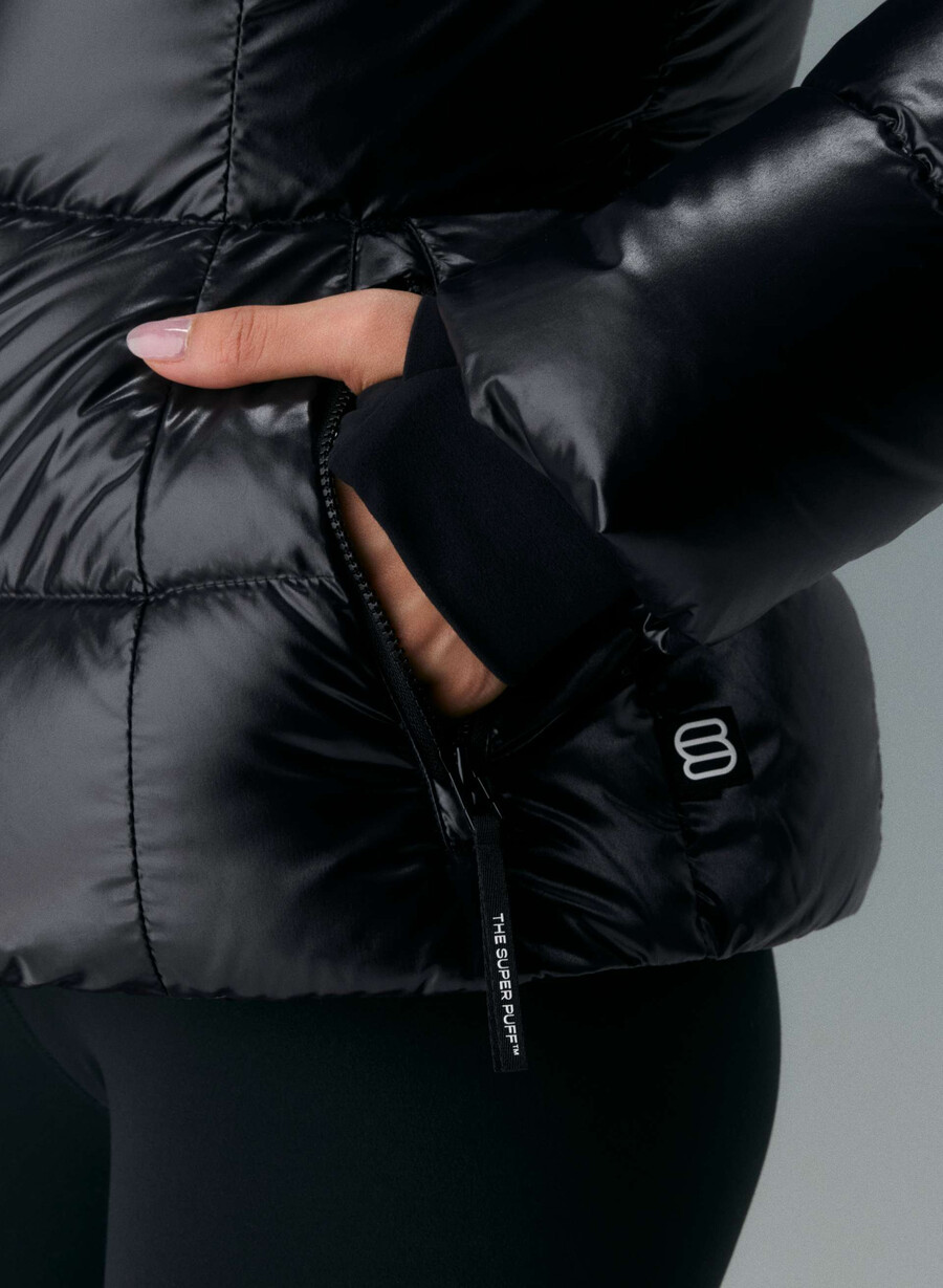 supersnug puff – høyglanset svartsvart